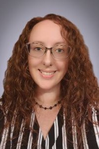 Lauren "Kirby" Brunk professional headshot.