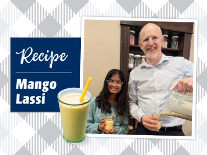 Graphic includes the words "Recipe Mango Lassi" and a photo of Executive Vice President & Chief Financial Officer Jon Aerni with his daughter, each holding a glass of Mango Lassi. The background of the image is white and gray checkered.