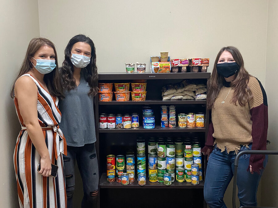 Students at a community college's food pantry
